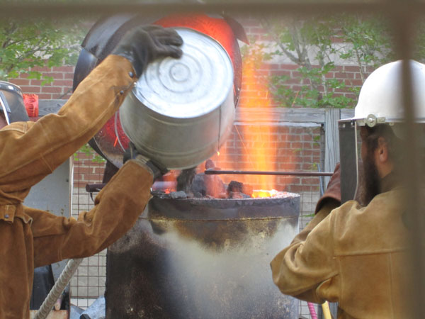 Loading up the furnace with coke and iron